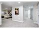 Finished basement featuring a seating area, neutral carpet, and ample lighting at 1378 Forest St, Denver, CO 80220