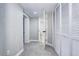 Hallway featuring neutral carpet, white walls, recessed lighting and closet with louvered doors at 1378 Forest St, Denver, CO 80220