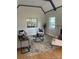 Comfortable living room with hardwood floors, bright windows, and a fireplace at 1378 Forest St, Denver, CO 80220