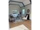 Bright living room with a fireplace, hardwood floors, and modern furniture at 1378 Forest St, Denver, CO 80220