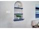 Stylish arched wall niche with decorative shelving and accents at 1378 Forest St, Denver, CO 80220