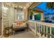Back porch with patio furniture, string lights, and an outdoor heater for relaxation and enjoyment at 13053 Umatilla Ct, Denver, CO 80234