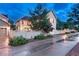 Exterior of a two-story home with a fenced yard and a paved driveway at 13053 Umatilla Ct, Denver, CO 80234