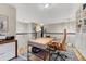 Upstairs office with built-in bookshelves, lots of natural light and comfortable seating at 13053 Umatilla Ct, Denver, CO 80234