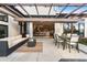Outdoor patio featuring an open transition into the interior dining and kitchen areas with an awning above at 8240 W Tennessee Ave, Lakewood, CO 80226