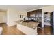 The kitchen showcases granite countertops, a center island, and a pantry, providing ample storage and prep space at 12291 Coral Burst Ct, Parker, CO 80134