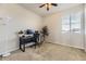 Bright office space with a modern desk setup, a comfortable chair, and natural light from a large window at 12291 Coral Burst Ct, Parker, CO 80134