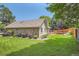 House exterior and spacious backyard with landscaping at 8272 Bighorn Ct, Lone Tree, CO 80124