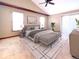 Spacious primary bedroom with high ceilings and backyard access at 8272 Bighorn Ct, Lone Tree, CO 80124