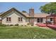 House back view, showcasing a large backyard, deck, and pergola at 8272 Bighorn Ct, Lone Tree, CO 80124