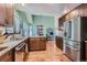 Kitchen with stainless steel appliances and granite countertops at 8272 Bighorn Ct, Lone Tree, CO 80124