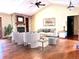 Spacious living room with fireplace and hardwood floors at 8272 Bighorn Ct, Lone Tree, CO 80124