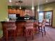 Well-equipped kitchen with stainless steel appliances, ample counter space, and seating at the bar at 4327 E 98Th Pl, Thornton, CO 80229