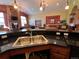 Community kitchen area featuring black countertop and stainless steel sink at 4327 E 98Th Pl, Thornton, CO 80229