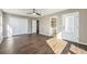 Spacious bedroom featuring hardwood floors, ensuite bathroom, and natural light at 2409 W 38Th Ave, Denver, CO 80211