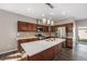Modern kitchen featuring an island with white countertops and stainless steel appliances at 2409 W 38Th Ave, Denver, CO 80211