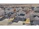 Overhead view of a lovely home with an attached three-car garage, surrounded by a beautiful, established neighborhood at 4844 Mt Evans St, Brighton, CO 80601