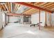 Unfinished basement with open layout, exposed ceiling, and concrete flooring, ready for customization at 4844 Mt Evans St, Brighton, CO 80601