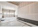 Unfinished two car garage with drywall and concrete floor, ready to be fully finished at 13729 Daffodil Pt, Parker, CO 80134
