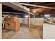 Spacious unfinished basement offers potential for customization at 1900 S University Blvd, Denver, CO 80210