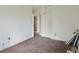 Bedroom featuring built-in wardrobe and natural light, undergoing renovation at 1900 S University Blvd, Denver, CO 80210
