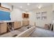 Bright kitchen undergoing renovation with new cabinets, sink, and natural light at 1900 S University Blvd, Denver, CO 80210