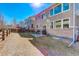 Backyard featuring a patio, wood fence, and a well-maintained lawn at 26881 E Roxbury Pl, Aurora, CO 80016