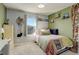 This cozy bedroom features soft carpet and decorative details at 26881 E Roxbury Pl, Aurora, CO 80016