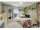 Cozy bedroom featuring cheerful decor, soft carpet, and ample natural light for a restful retreat at 26881 E Roxbury Pl, Aurora, CO 80016