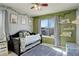 This bedroom features soft carpet and fun decorations at 26881 E Roxbury Pl, Aurora, CO 80016