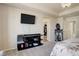 Main bedroom featuring a closet and soft carpet for comfort and convenience at 26881 E Roxbury Pl, Aurora, CO 80016