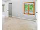 Bedroom featuring a large window offering green outdoor views at 7873 E Colgate Pl, Denver, CO 80231
