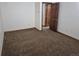Neutral carpeted bedroom presents a blank canvas for personalization and comfort at 11196 E Baltic Dr, Aurora, CO 80014