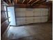 Spacious two-car garage with overhead storage and ample room for parking at 11196 E Baltic Dr, Aurora, CO 80014