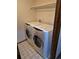 Laundry room with washer and dryer offers modern convenience for household chores at 11196 E Baltic Dr, Aurora, CO 80014
