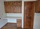 Home office area features built-in shelves and drawers, perfect for remote work at 11196 E Baltic Dr, Aurora, CO 80014