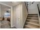 Basement stairs leading to a finished basement with additional living space at 16845 Buffalo Valley Path, Monument, CO 80132