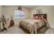 Basement bedroom with double bed and plenty of natural light at 16845 Buffalo Valley Path, Monument, CO 80132