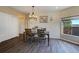 Dining area with hardwood floors and view to backyard at 16845 Buffalo Valley Path, Monument, CO 80132