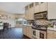 Modern kitchen with stainless steel appliances and granite countertops at 16845 Buffalo Valley Path, Monument, CO 80132