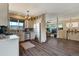 Open concept kitchen with stainless steel appliances and view to living room at 16845 Buffalo Valley Path, Monument, CO 80132