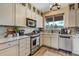 Updated kitchen with stainless steel appliances and ample cabinetry at 16845 Buffalo Valley Path, Monument, CO 80132
