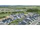 Overhead shot of neighborhood highlighting houses and surrounding green spaces, emphasizing community living at 624 Simmental Loop, Castle Rock, CO 80104