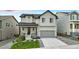 Charming two-story home with a well-maintained front yard and a cozy porch at 624 Simmental Loop, Castle Rock, CO 80104