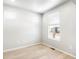 Bright bedroom with light wood flooring and natural light coming through the window at 22495 E 7Th Pl, Aurora, CO 80018