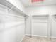 Functional walk-in closet with shelving and hanging rods for organized storage space at 22495 E 7Th Pl, Aurora, CO 80018