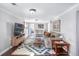 Finished basement featuring a plush rug, comfortable seating, and ample lighting at 5132 Eaton St, Denver, CO 80212