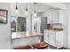Modern kitchen featuring granite countertops, stainless steel appliances, and an attached breakfast bar at 5132 Eaton St, Denver, CO 80212