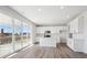 Modern kitchen featuring white cabinets, stainless steel appliances, and a center island at 1100 Joseph Pl, Erie, CO 80026