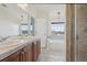 Bathroom with double sinks, soaking tub, and separate shower at 4321 W 118Th Pl, Westminster, CO 80031